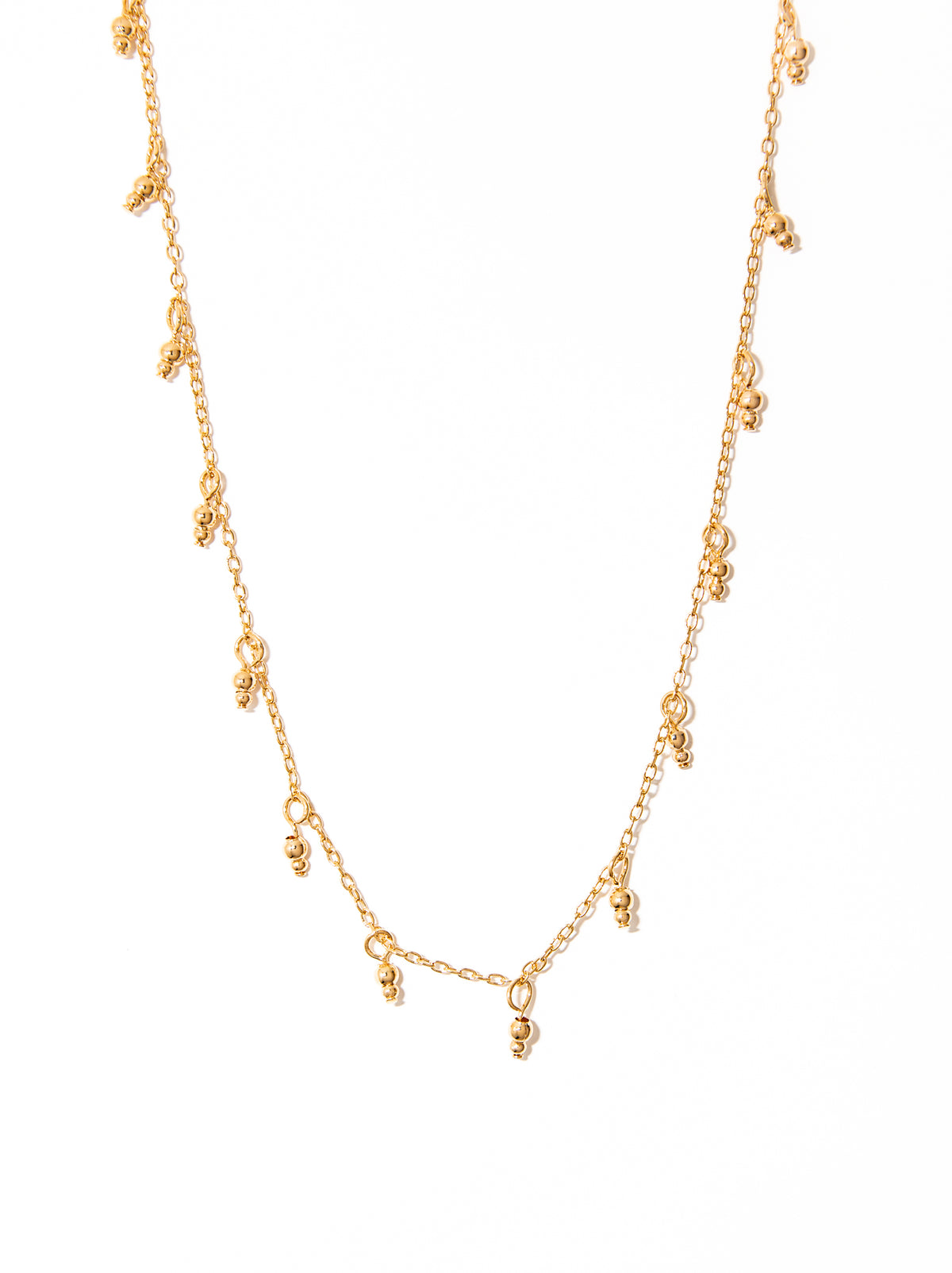 colar longo banhado a ouro 18k bolinhas de metal - Peacok