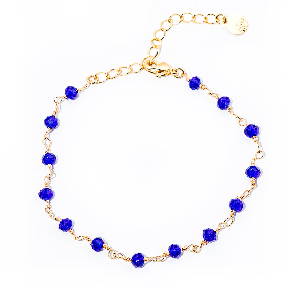 pulseira de cristal azul royal banhada a ouro 18 k - Reia