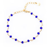 pulseira de cristal azul royal banhada a ouro 18 k - Reia