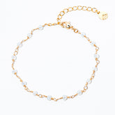 pulseira de cristal branco banhada a ouro 18 k - Reia